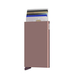 Lieblingstasche Secrid Cardprotector in metallic rose gold, a slim aluminium RFID-blocking card holder for six cards.