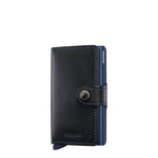 Lieblingstasche Secrid Miniwallet in black leather with blue metal card protector and snap button closure