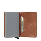 Lieblingstasche Secrid Slimwallet in brown leather with a silver RFID-blocking card protector mechanism