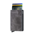 Lieblingstasche Secrid Slimwallet in grey vintage leather with RFID-protected card mechanism and card slots.
