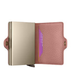 Lieblingstasche Secrid Twinwallet Pebble in dusty pink leather with a metallic gold RFID-blocking card protector.