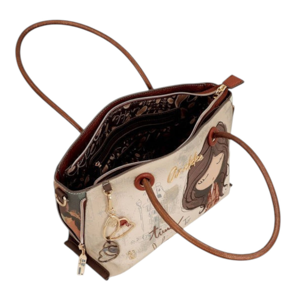 Lieblingstasche short handle bag in cream with a whimsical illustrated girl print and brown leather-look trim