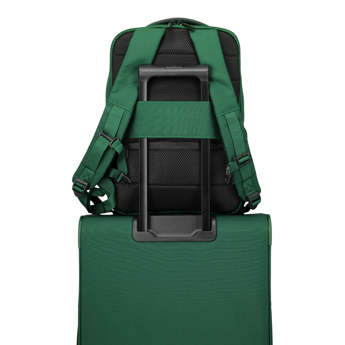 Lieblingstasche Skaii Rucksack M in green attached to a matching suitcase handle with padded back and straps