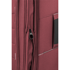 Close-up of the burgundy Lieblingstasche Skaii trolley suitcase showing the expandable zipper and durable fabric