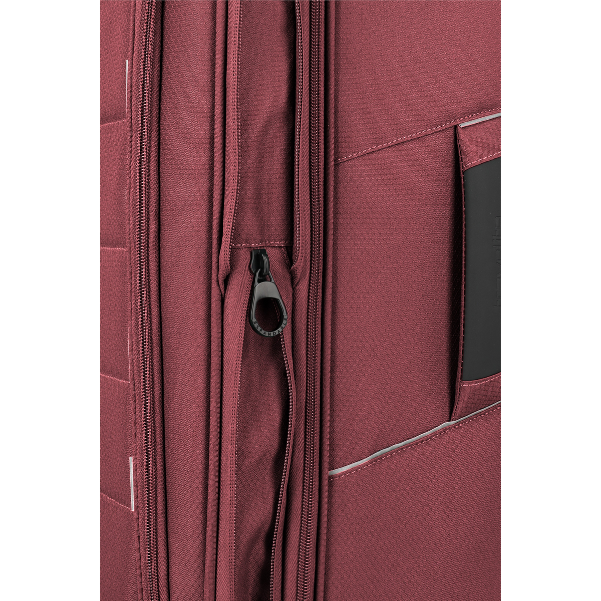 Close-up of the burgundy Lieblingstasche Skaii trolley suitcase showing the expandable zipper and durable fabric