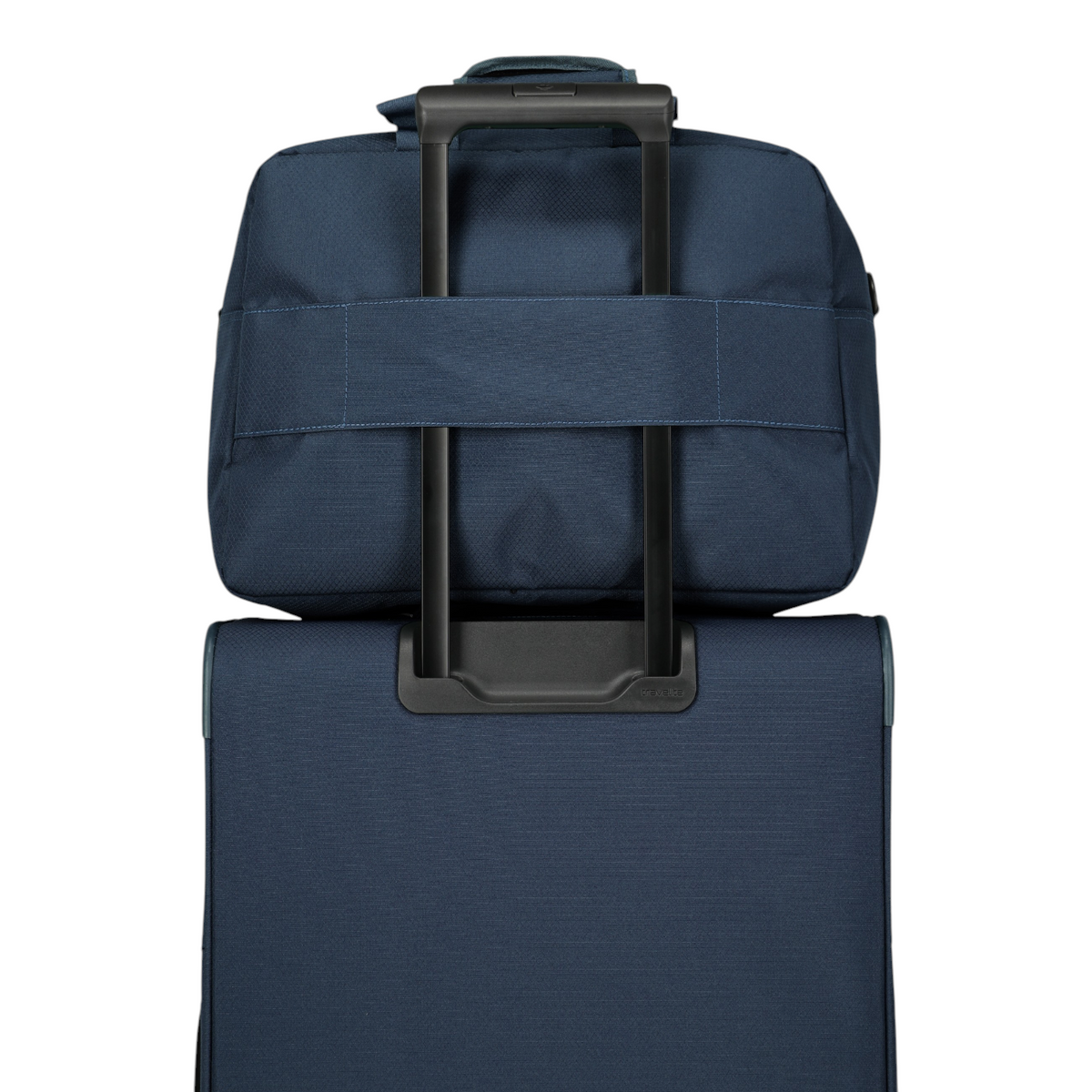Lieblingstasche Skaii Weekender in navy blue attached to a matching suitcase handle for easy travel