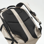 Lieblingstasche Tall41 beige travel backpack featuring a breathable black mesh back panel and padded shoulder straps