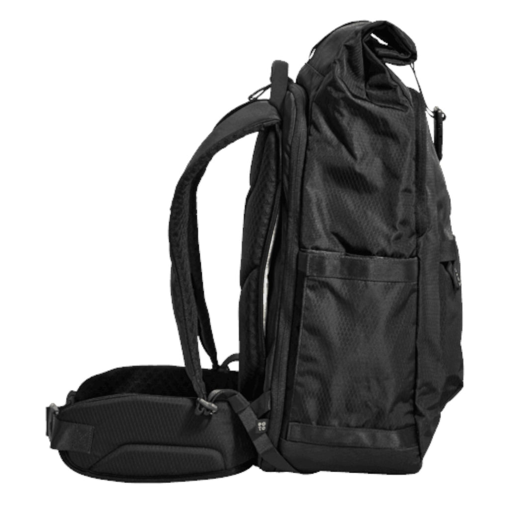 Lieblingstasche Tall41 black rolltop travel backpack with side view showing padded straps and waist belt