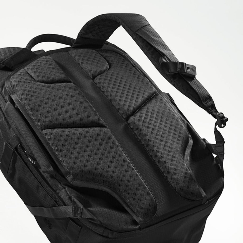Lieblingstasche Tall41 black travel backpack showing the breathable padded back panel and adjustable shoulder straps