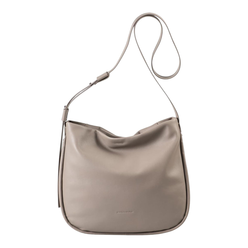 Lieblingstasche Coral taupe leather hobo shoulder bag with an adjustable strap against a white background