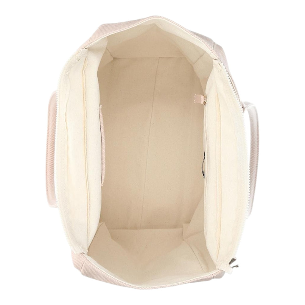 Top view of the Lieblingstasche Tote L in a soft beige shade, showing the spacious interior and zipper closure.