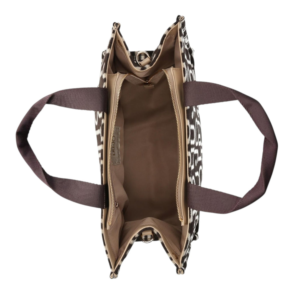 Lieblingstasche Tote Logo Allover L bag top view showing beige and black patterned exterior and spacious interior