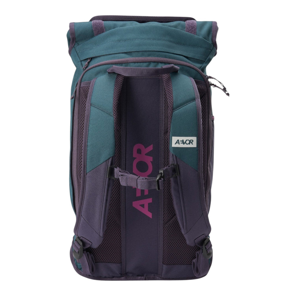 Lieblingstasche Trip Pack backpack in teal and purple with padded mesh back panel and adjustable chest strap