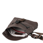 Lieblingstasche Tsu brown leather crossbody bag with open flap showing grid pattern lining and red zipper detail