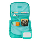 Lieblingstasche turquoise toiletry bag with internal compartments, toothbrush, hairbrush, and detachable mirror.