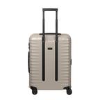Lieblingstasche UPGRADE 4w Trolley M in beige with a hard shell, telescopic handle, and four spinner wheels.