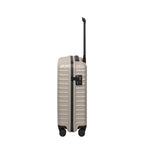 Lieblingstasche UPGRADE 4w Trolley S20 in beige with a hard shell, side handle, and TSA lock on a black background