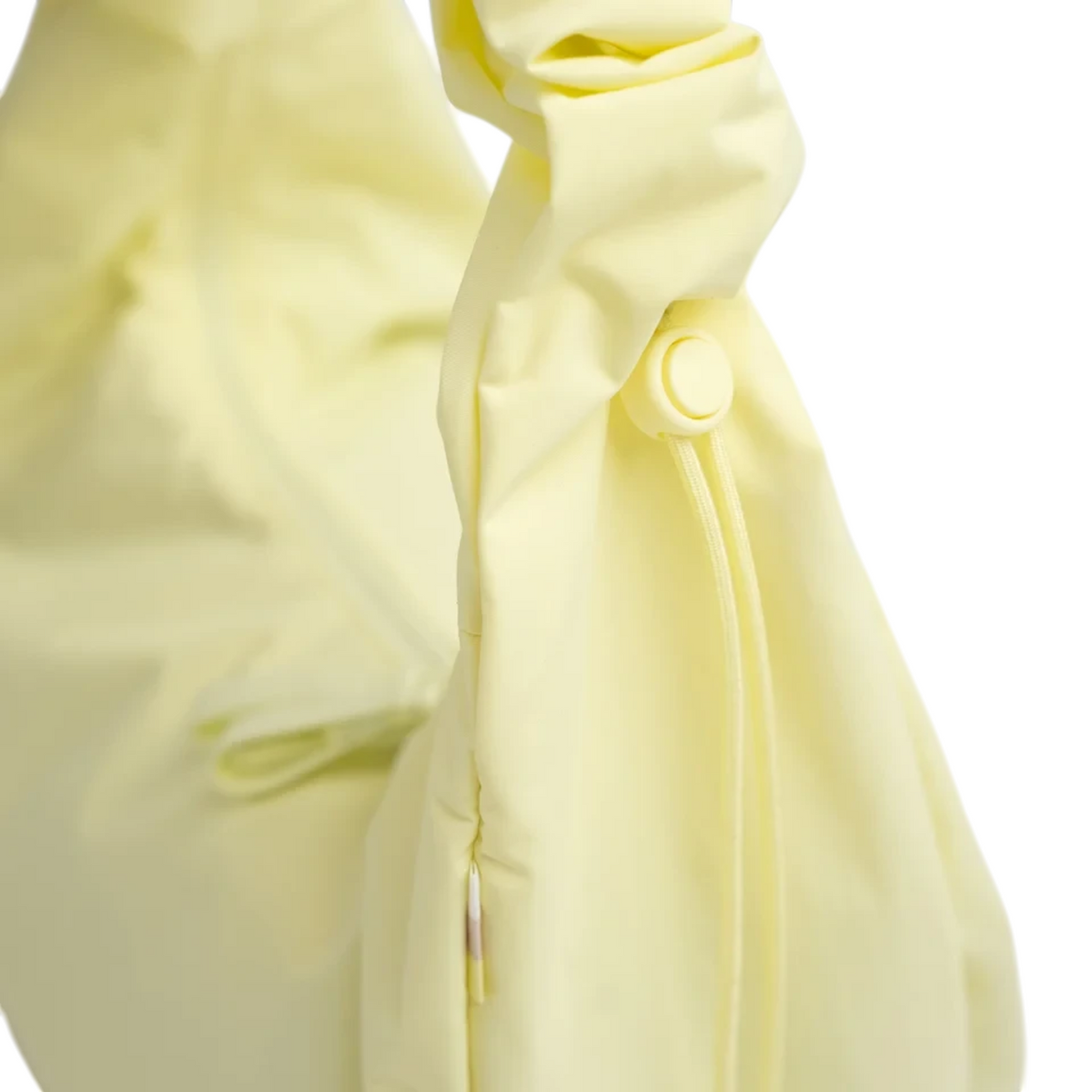 Lieblingstasche Moon Bag Ruffle Large in pale yellow with gathered fabric detail and adjustable drawstring closure
