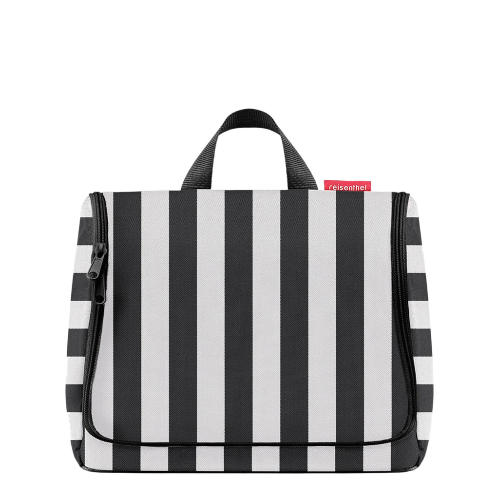 Lieblingstasche Toiletbag XL in black and white vertical stripes with a sturdy top handle and zipper closure