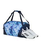 Lieblingstasche satch sports bag in blue patterned fabric with a dedicated side compartment for white sneakers.